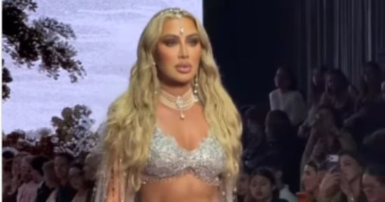 مايا دياب تخطف الأنظار بإطلالة فضية براقة في أسبوع الأزياء بدبي